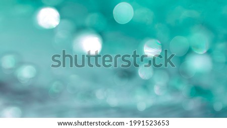 abstract aquamarine background defocused light bokeh photo effect