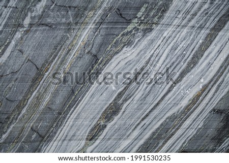 Gray marble texture with fine white veins