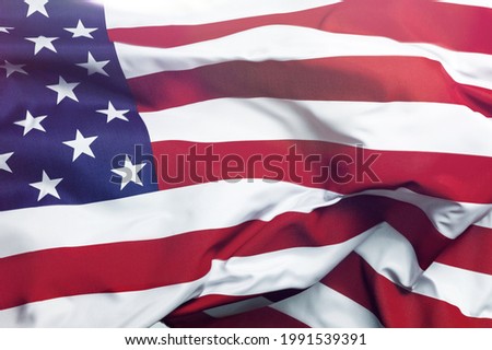 classic usa american flag with sun glare.