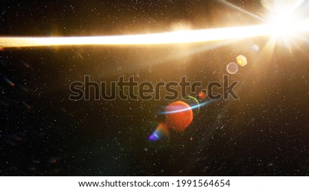 Easy to add lens flare effects for overlay designs or screen blending mode to make high-quality images. Abstract sun burst, digital flare, iridescent glare over starry sky background.