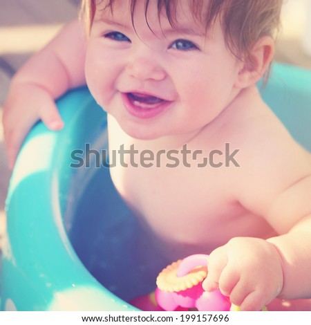 Baby in bath tub with instagram effect
