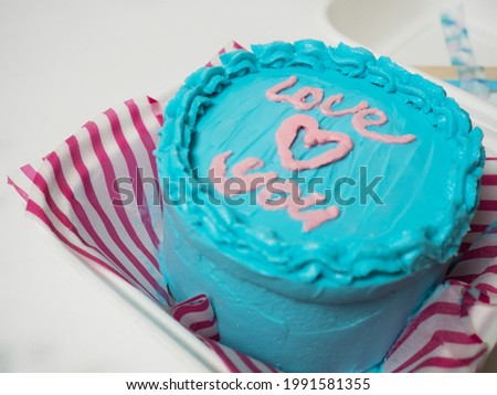 Korean cake lunch box, cake with the words love you and a heart. place for your text