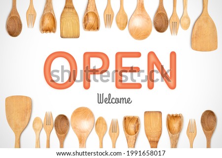 Open welcome with wooden kitchen accessories frame isolated white background. suitable for restaurant decoration. 3d typography image.
