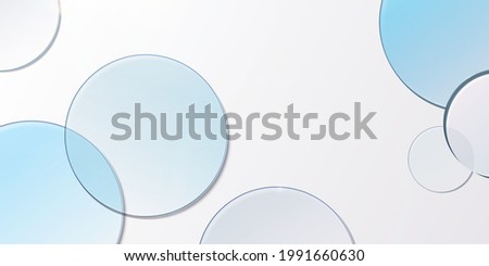 Minimal 3D product display background with blue glass blue transparent disk in top view. Royalty-Free Stock Photo #1991660630