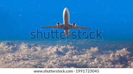 Passenger plane flying in the night
