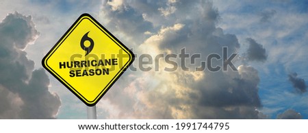 hurricane season sign on cloudy background