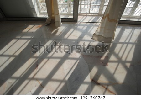 Light and shadow through the balcony during a beautiful day