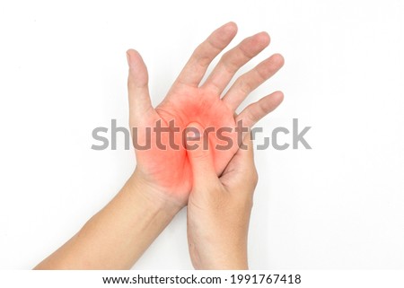 Burning sensation in palm of Asian young man with diabetes. Concept of hand pain. Isolated on white. Royalty-Free Stock Photo #1991767418
