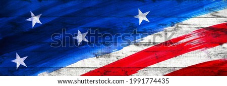 Vintage wood background with USA flag elements in blue red white colors. USA Independence Day, Fourth of July, Memorial Day, Veterans Day, Armed Forces Day concept. Copy space. Design. Wide banner. 