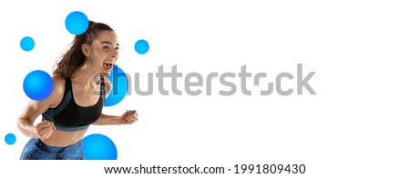 Shouting. Young girl, professional track athlete posing isolated over white background. Concept of sport, healthy lifestyle, competition, motion, physical activity. Copy space for ad. Flyer