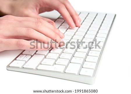 White wireless computer keyboard isolated. Russian-English keyboard layout