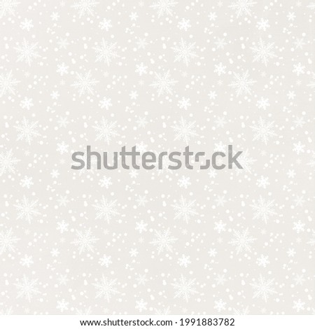 Pattern with snow. Winter background on beige base. Artistic wrapping paper for gifts or fabric prints on Christmas theme. Xmas holiday. New Year background. Card for New Year. 
