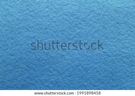 Soft blue felt fabric. Felt texture for background