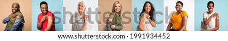 V-Day. Portrait Of Happy Smiling Multicultural People Showing Vaccinated Shoulder Hand With Patch After Getting Antiviral Covid Vaccine Jab, Posing On Studio Background, Looking At Camera, Banner Royalty-Free Stock Photo #1991934452