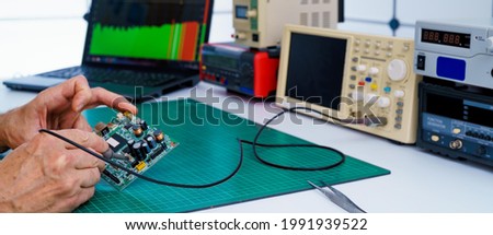 Repair of consumer electronics in the service center Royalty-Free Stock Photo #1991939522