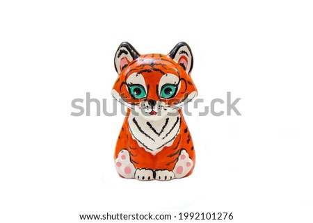 toy figurine tiger on white background, isolated. Simbol of the year 2022
