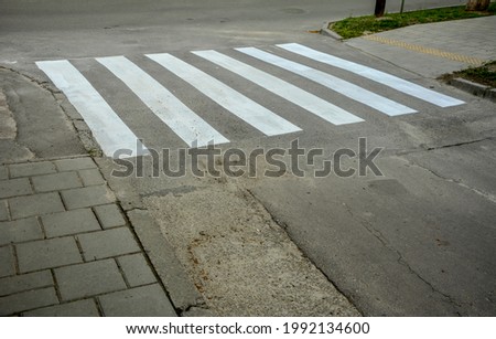 crosswalk on the road for safety when people walking cross the street, Crosswalk on the street for safety, logistic import export and transport industry.Crosswalk in Black and white