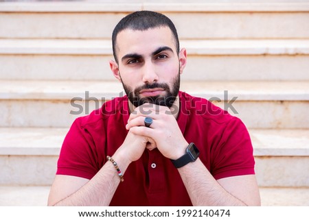 Man sitting on stairs and thinking