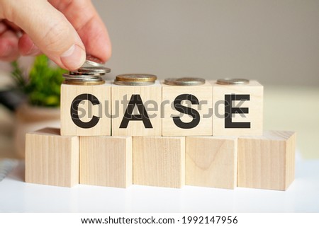 case letters written on wooden toy blocks, business concept