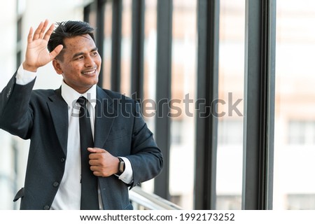 Close-up portrait of handsome young asian man wear a suit
