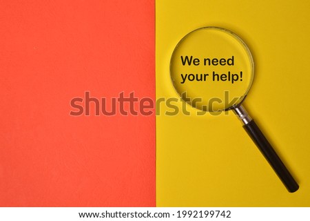 Magnifying glass written with text WE NEED YOUR HELP!