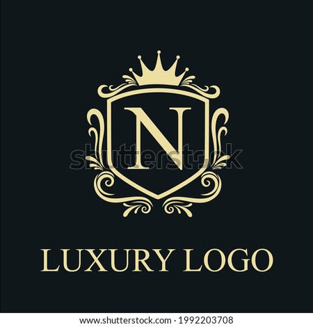 Golden Luxury N Initial Letter Logo Design Template with Shield and Floral Vintage Ornament for Royalty, Wedding, Restaurant, Salon, Boutique, Cafe, Hotel, Heraldic, Jewelry, Fashion Business Brand