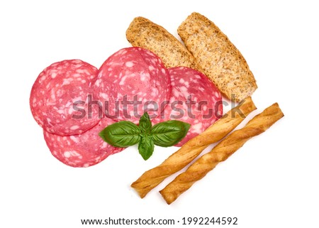 Cured Salchichon sausage, isolated on white background. High resolution image
