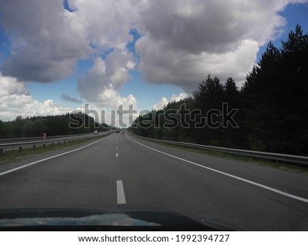 Road landscapes while traveling on the M4 Don highway filmed in good weather from a car