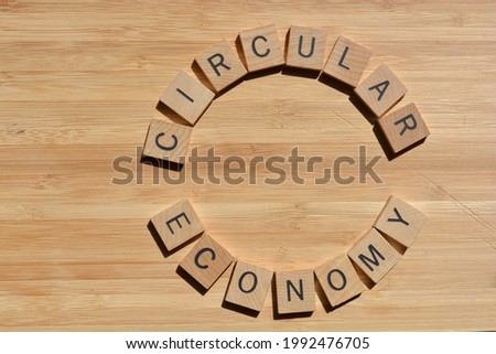 Circular Economy, words in wooden alphabet letters in a circle