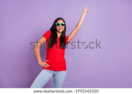 Photo of funky millennial brunette hairdo lady dance wear spectacles red t-shirt isolated on violet color background