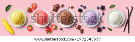 Set of bowls with various colorful Ice Cream scoops with different flavors and fresh ingredients on pink background, top view Royalty-Free Stock Photo #1992545639