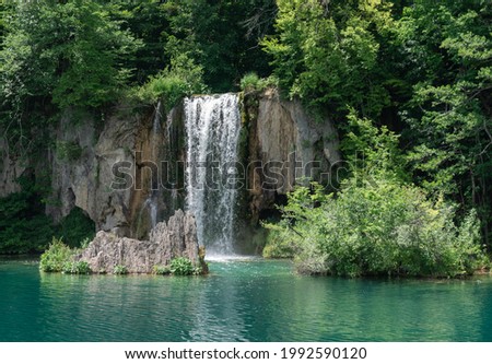 Plitvice Lakes in Croatia. Sightseeing place. Very popular among tourists. Beautiful Landscape and Nature. Daylight. Summer view of beautiful waterfalls in Plitvice Lakes National Park