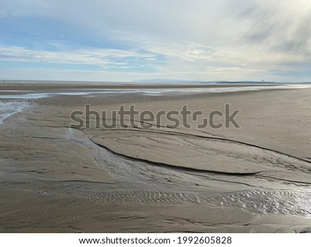 Camber Sands beach in England on a sunny summer's day