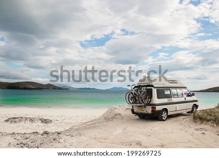 Camper van parked on a beach in the Isle of Lewis, Outer Hebrides, Scotland, UK. Royalty-Free Stock Photo #199269725