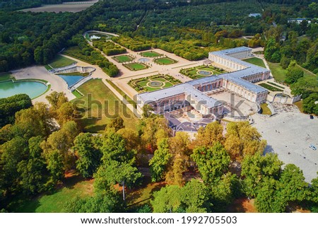 Aerial scenic view of Grand Trianon palace in the Gardens of Versailles near Paris, France Royalty-Free Stock Photo #1992705503