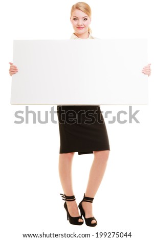 Advertisement. Elegant young woman holding blank copy space banner isolated on white. Businesswoman recommending your product.