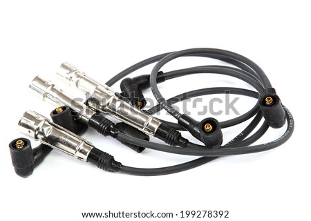 Cable high voltage spark plugs for car isolated on a white background.