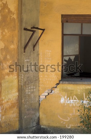 Broken Window and Yellow Wall