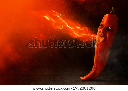 Red hot chili pepper on dark background