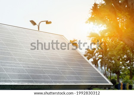 Rectangular solar panel in two meters long and one meter wide size was installed in the public park  to store sunlight energy in battery and use it with street lights around the public park at night.