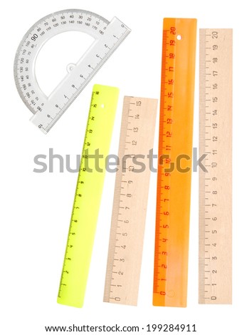 wooden and plastic rulers isolated on white