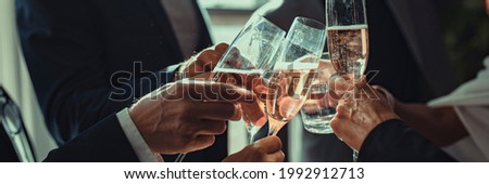 Business people making a toast at an office party Royalty-Free Stock Photo #1992912713