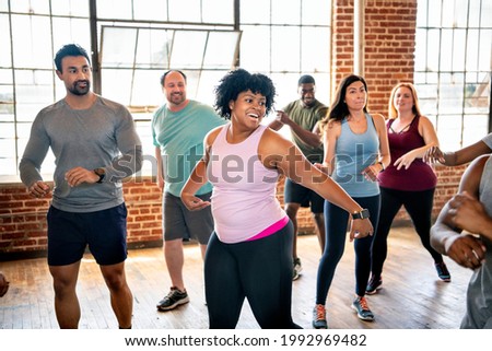 Diverse people in an active dance class Royalty-Free Stock Photo #1992969482