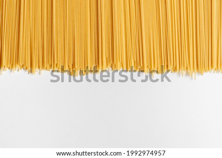 copy space design for text with raw food with italian pasta 