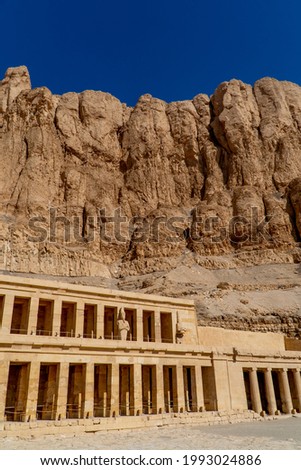Vertical view of columns at the Mortuary Temple of Queen Hatshepsut in Luxor, Egypt