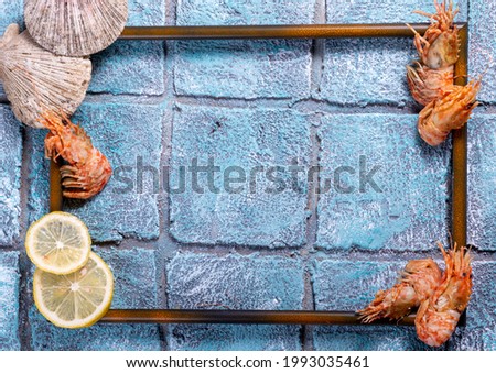 Seafood frame with blank space as a seafood concept. Place for your text. Shrimp, scallops and oysters.