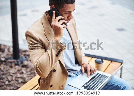 Close up of busy man working at his project