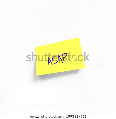Isolated Yellow sticker with ASAP Handwriting text on white Whatman paper. Concept programming, testing, business. Handwriting text, copy space Royalty-Free Stock Photo #1993117661