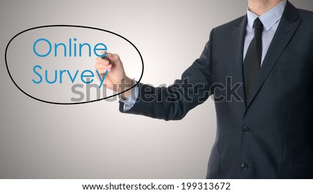 businessman hand with marker writing text online survey on grey background