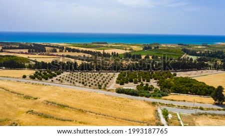 panoramic view of Cyprus road along coastline and small villages, aerial photography of popular tourist destination. clear sky